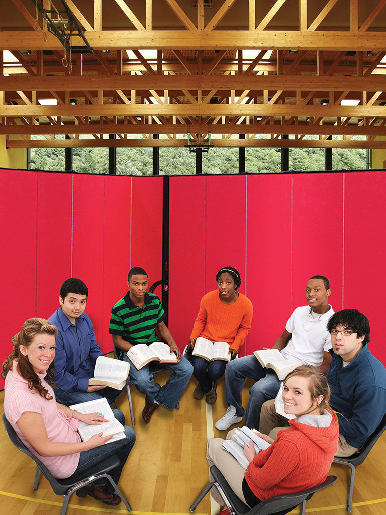 Movable, sound absorbing dividers create a more intimate and private room for focused collaboration and learning. 